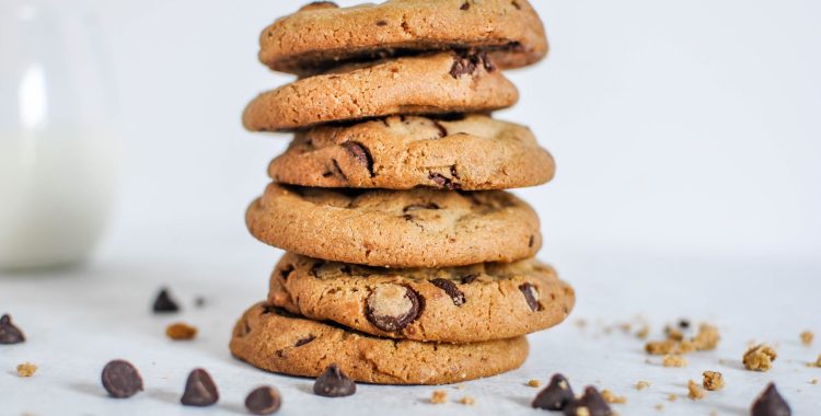 A wide selective closeup shot of a stack of baked chocolate cookies
